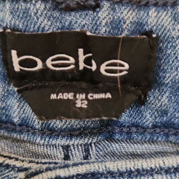 bebe Light Blue Flare Jeans with Button Accents - Picture 2 of 6